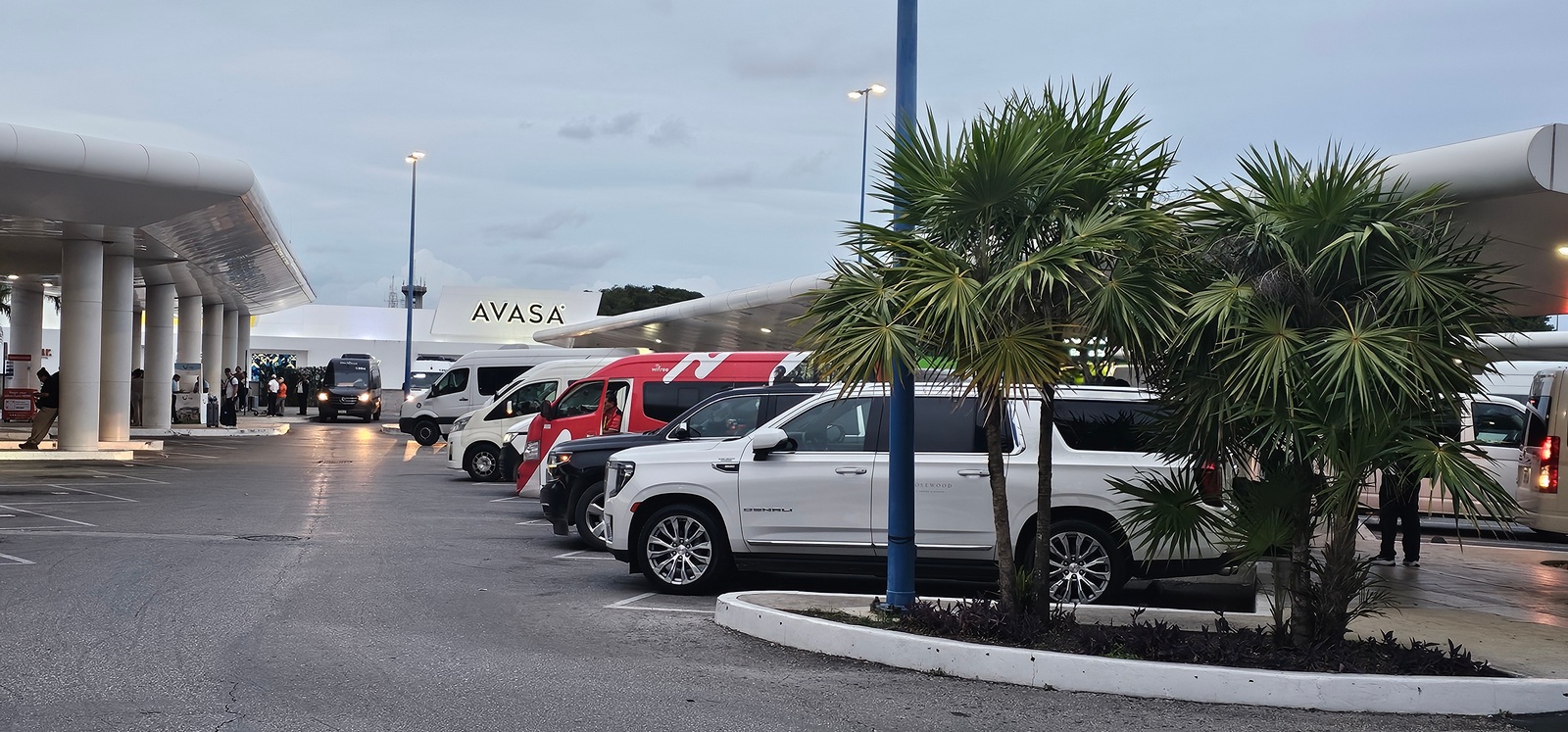 Vans and bus numbered slots at Terminal 2